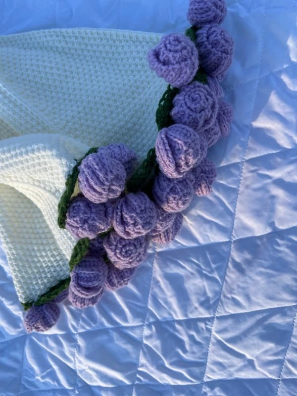 Purple knitted flowers